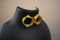 Modern Twist Hexagon Hoop Earrings – Gold Finish