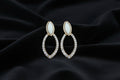 Elegant White Stone Oval Hoop Earrings with Crystal Detailing